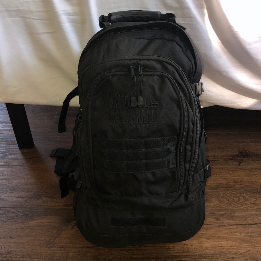 Absolutely huge National Guard backpack! Has so many extender clips and zippers